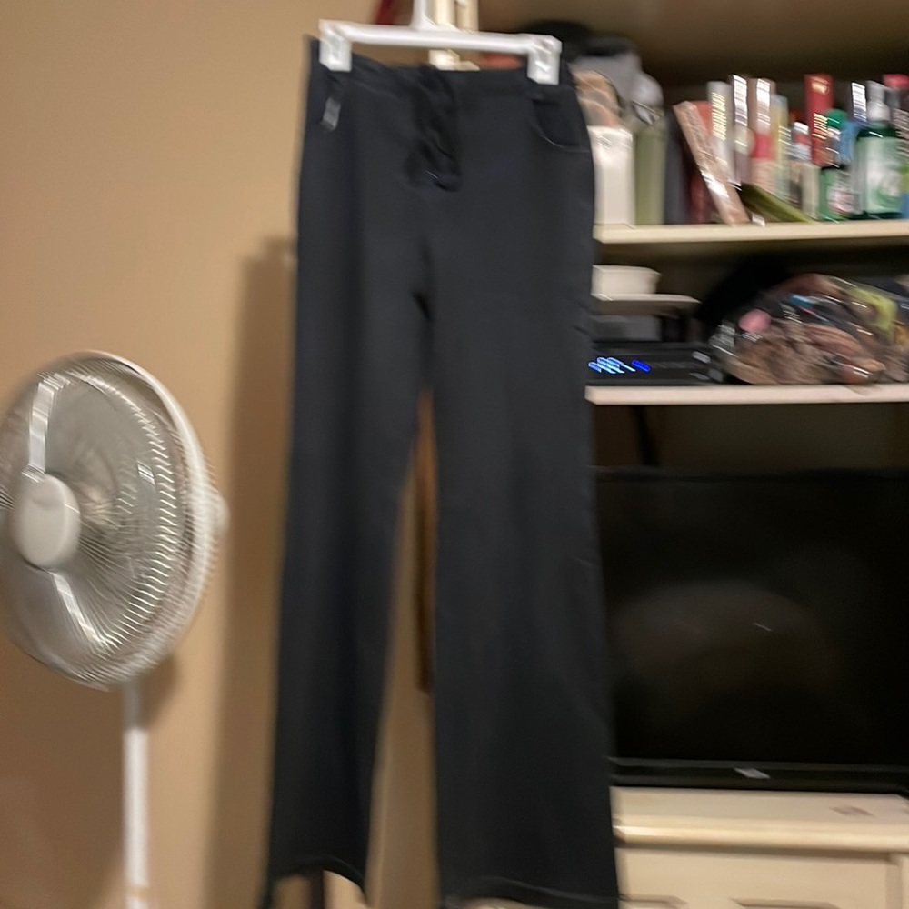 Anthropology “Flying Tomato” Flare wide leg jeans.